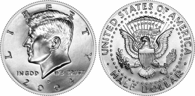 Comparison of 2004-P Kennedy half dollar with heavy bag marks (left, MS-63) versus a nearly mark-free MS-67 example (right)